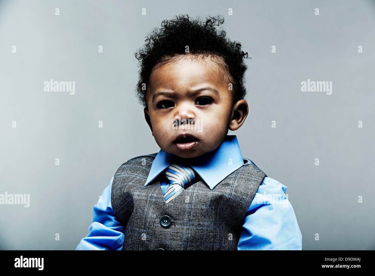 Portrait of baby boy wearing waistcoat, shirt and tie Stock Photo Alamy