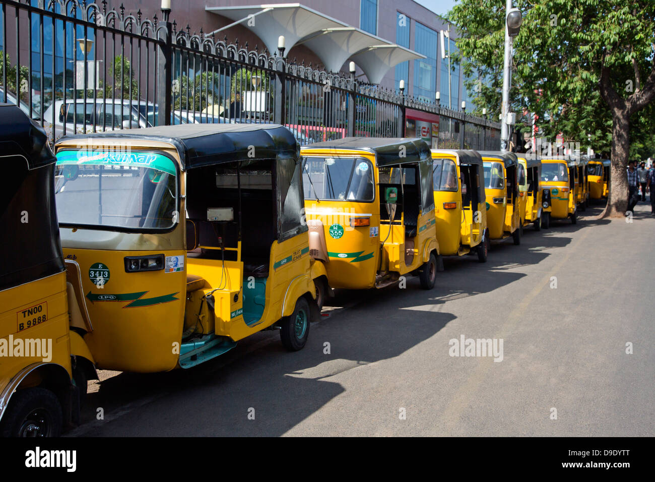 Auto rickshaws parked in front of a shopping mall, Express Avenue
