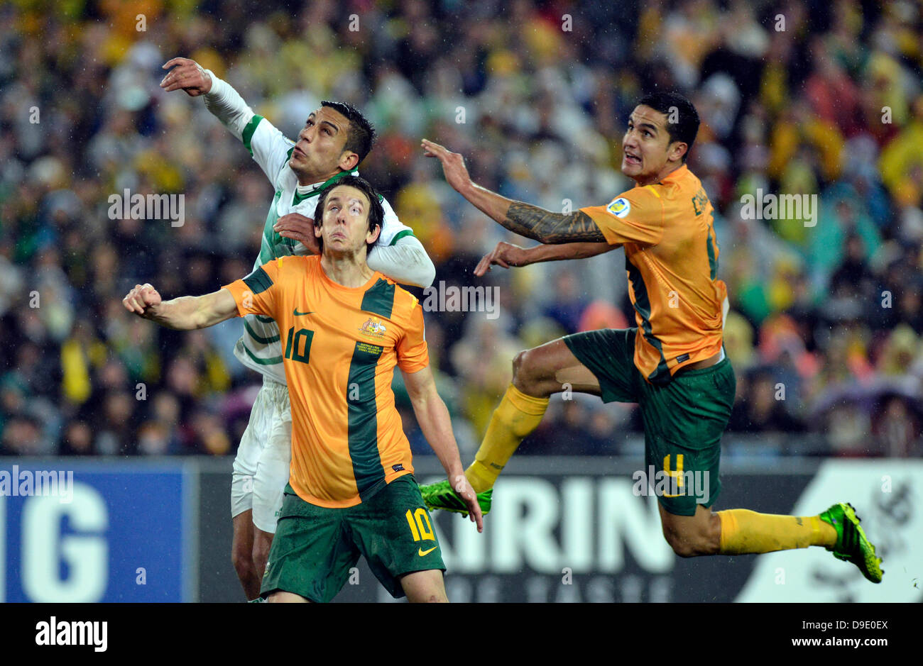 18.06.2013 Sydney, Australia. Socceroos forward Tim Cahill and Socceroos forward Robbie Kruse in action during the World Cup qualifier between Australia and Iraq at the ANZ Stadium, Sydney. Australia won 1-0. Stock Photo