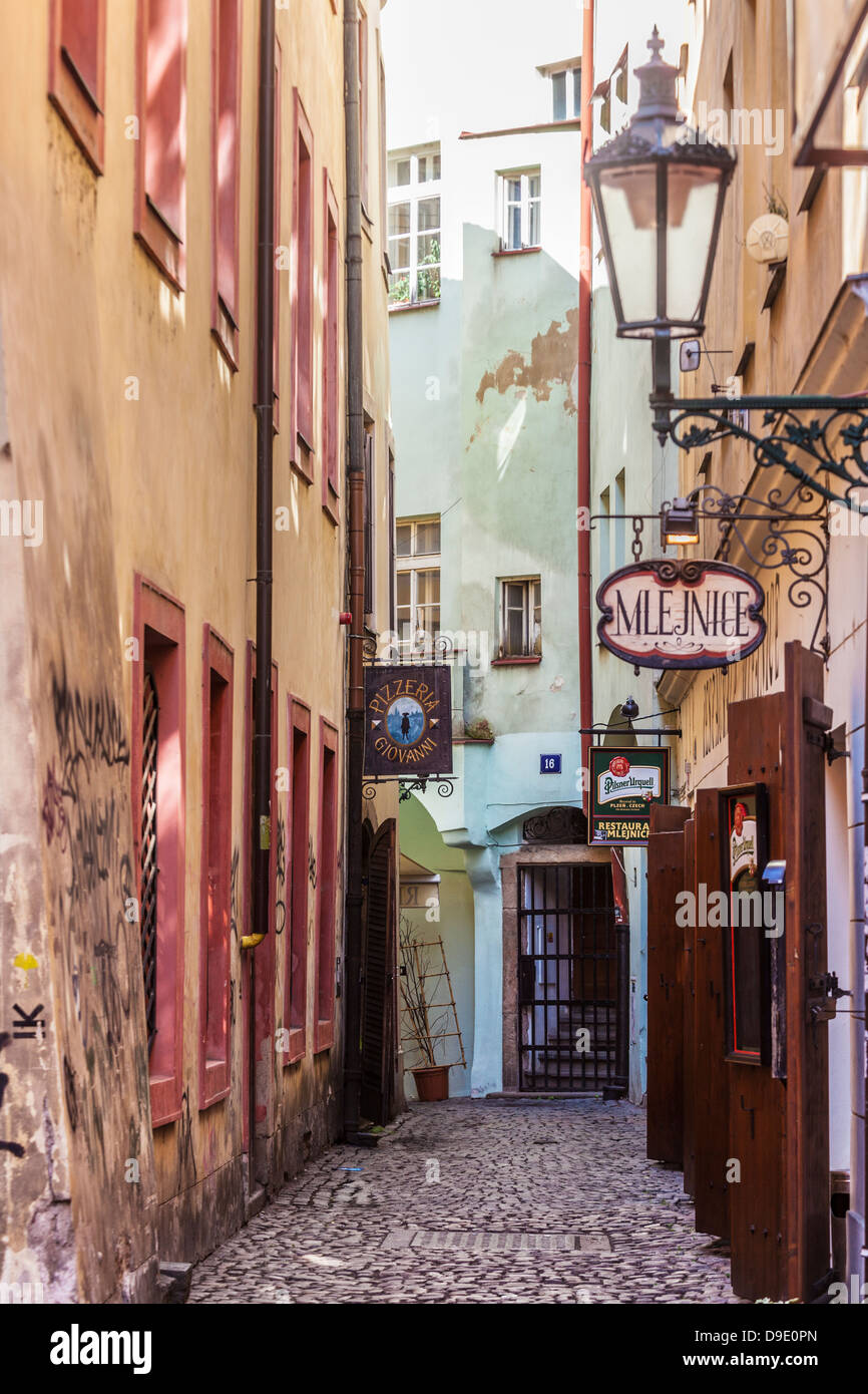 A small cobbled alleyway with bars and restaurants in the Old Town