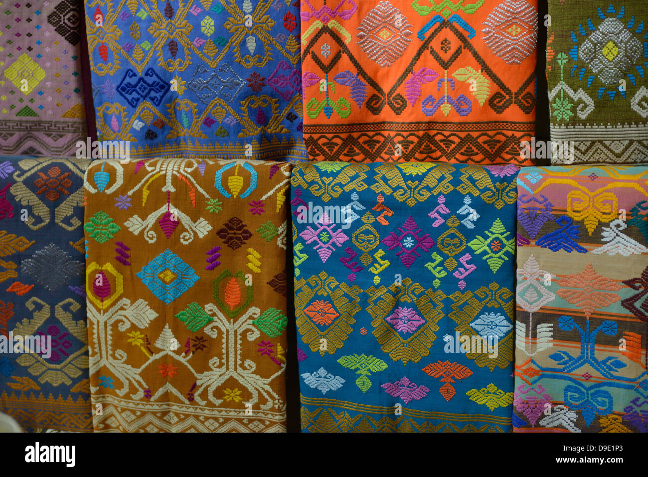 Indonesia, Bali, Klungkung, selling fabric at the market Stock Photo
