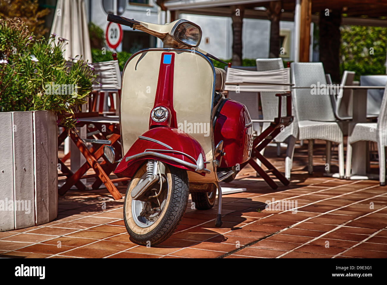 Scooter at a restaurant Stock Photo