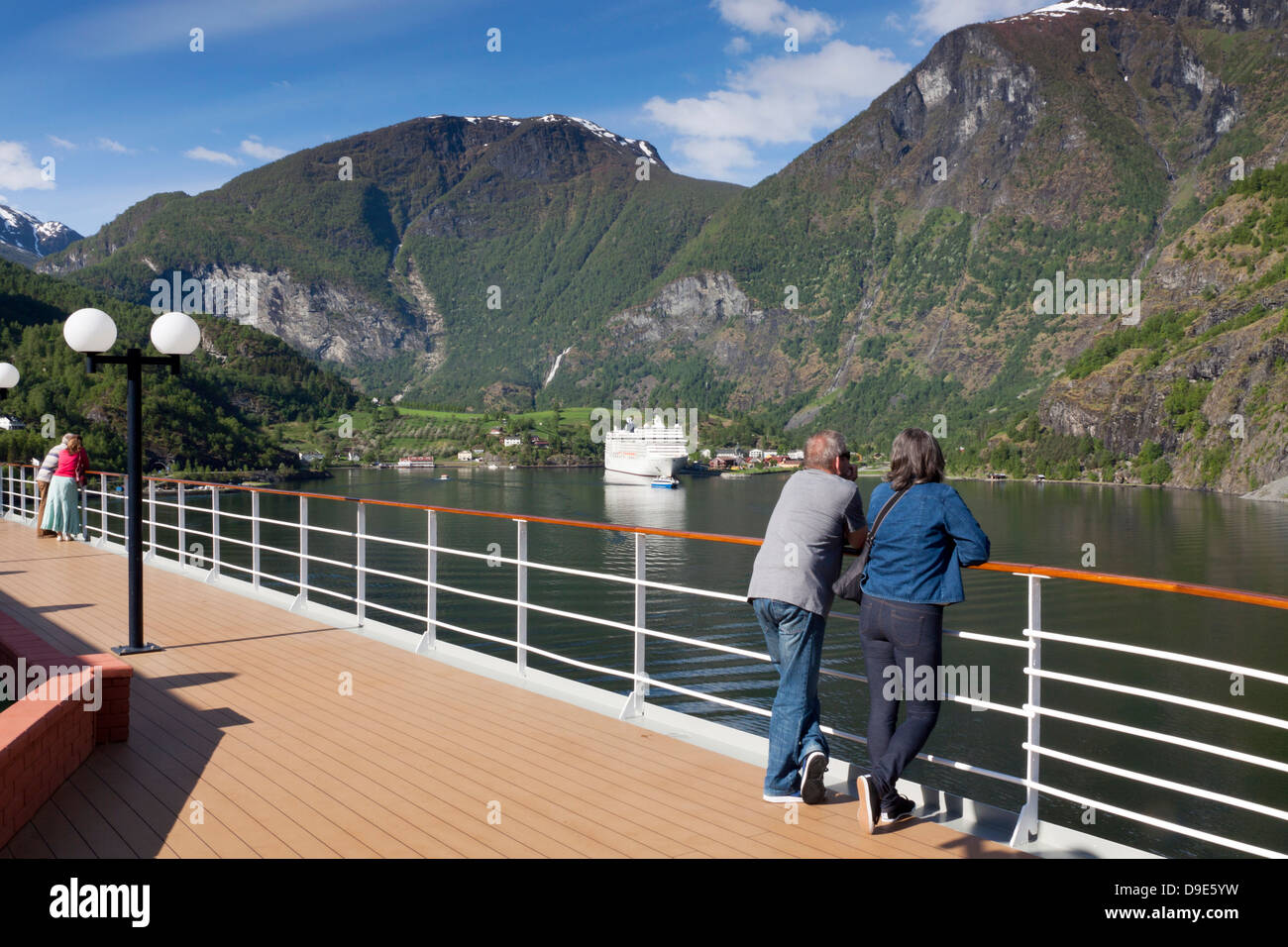 First sight of Flam at the inner end of Aurlandsfjord from the Italian cruise ship MSC Opera Stock Photo