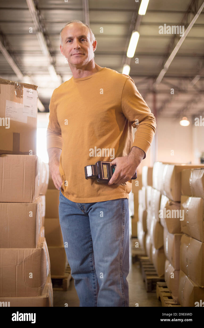 Portrait of male warehouse worker Stock Photo - Alamy