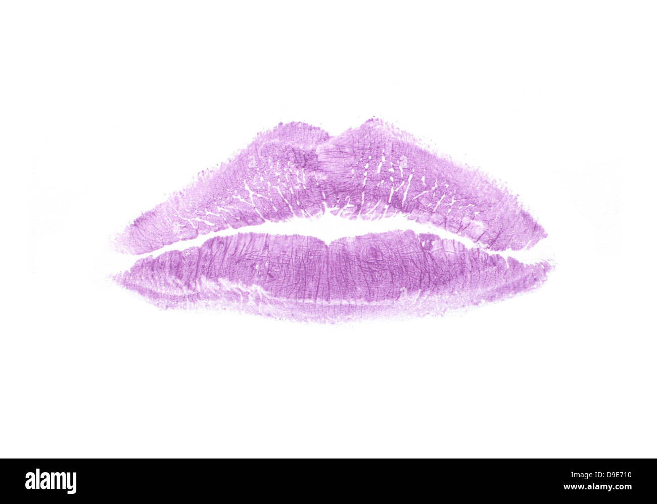 purple lipstick kiss print cut out onto white background Stock Photo
