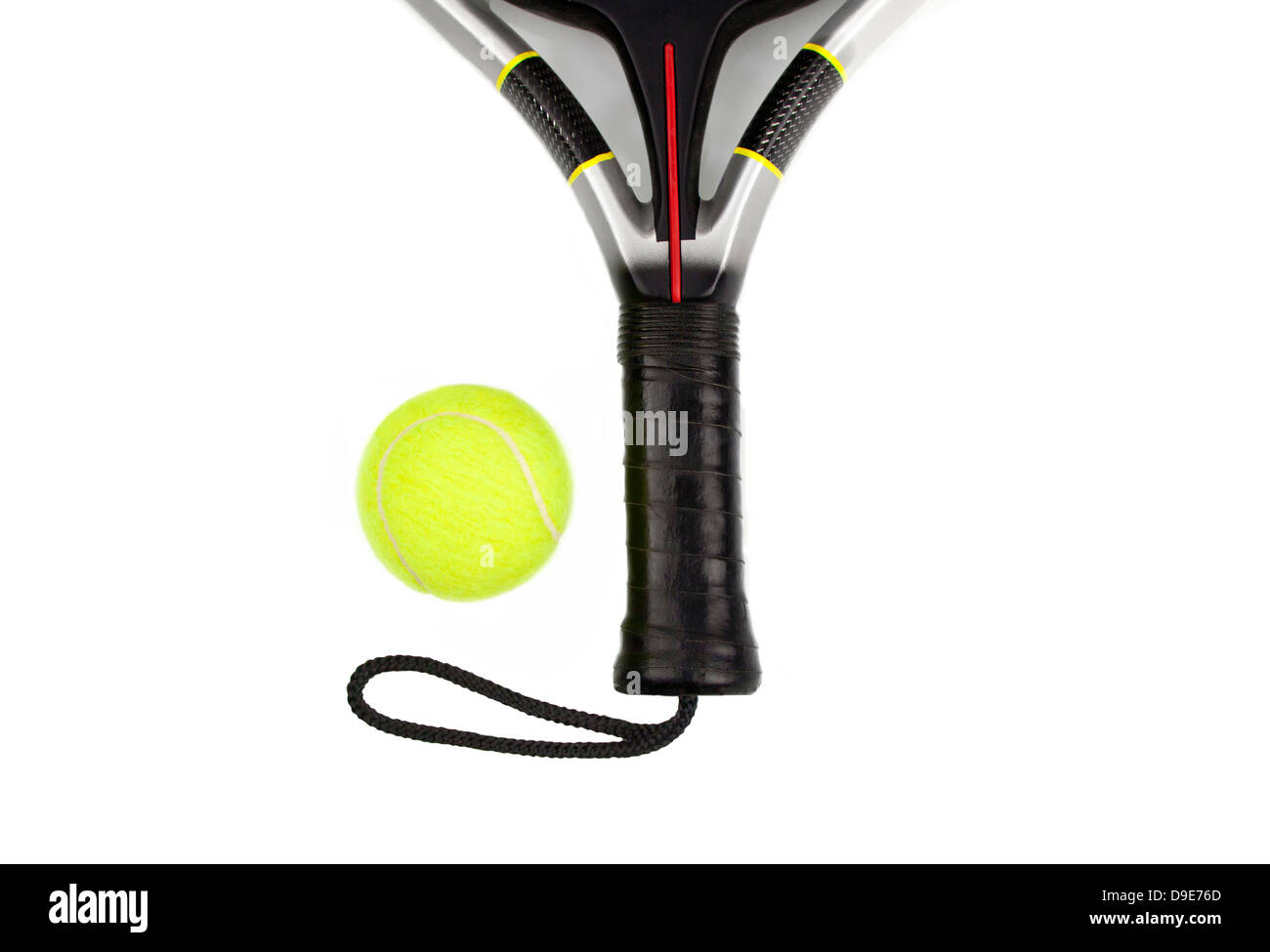 Professional padel-tennis racket and ball isolated in white background. Stock Photo