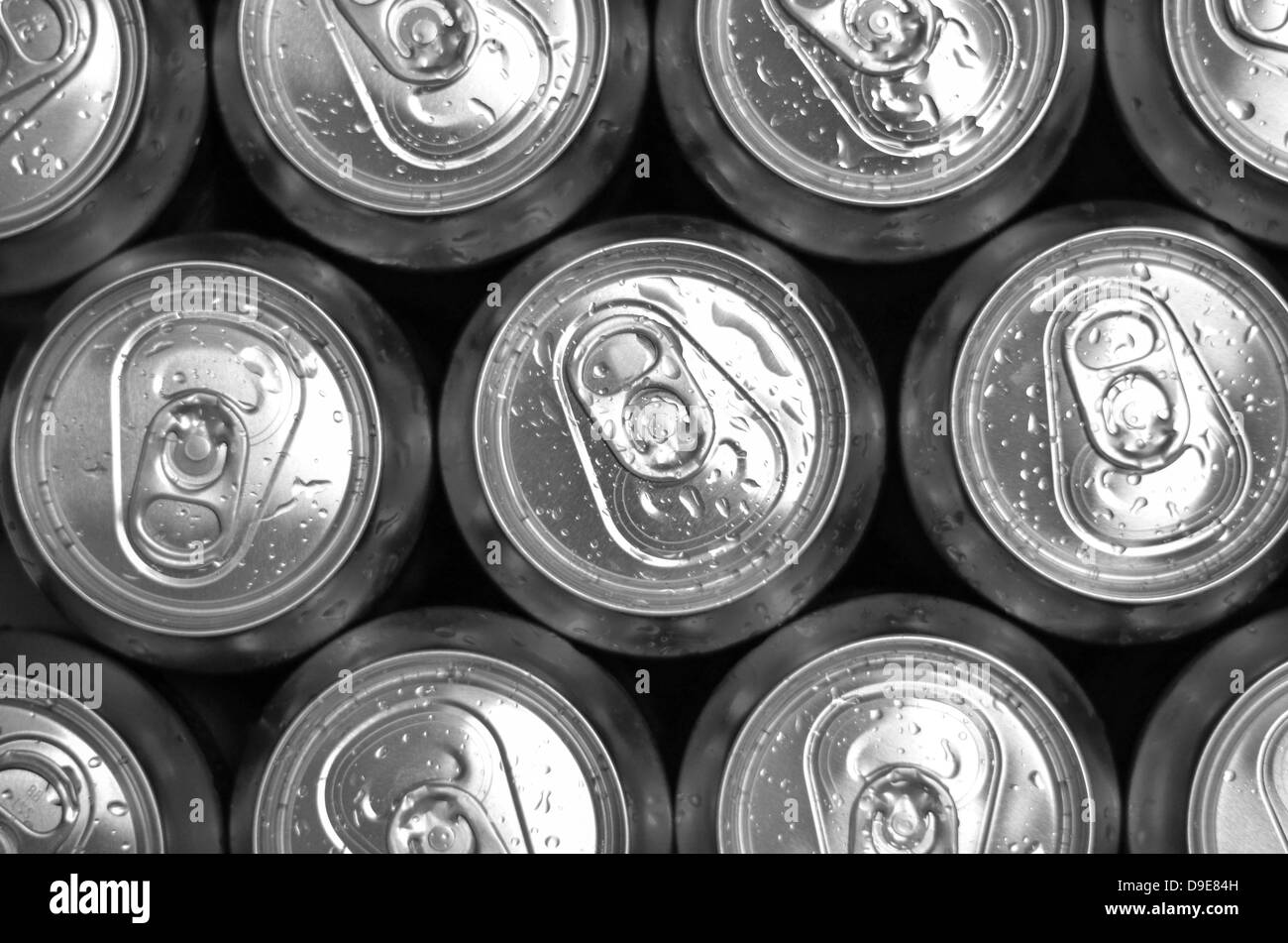Abstract view of cold cans with refreshing drink background Stock Photo