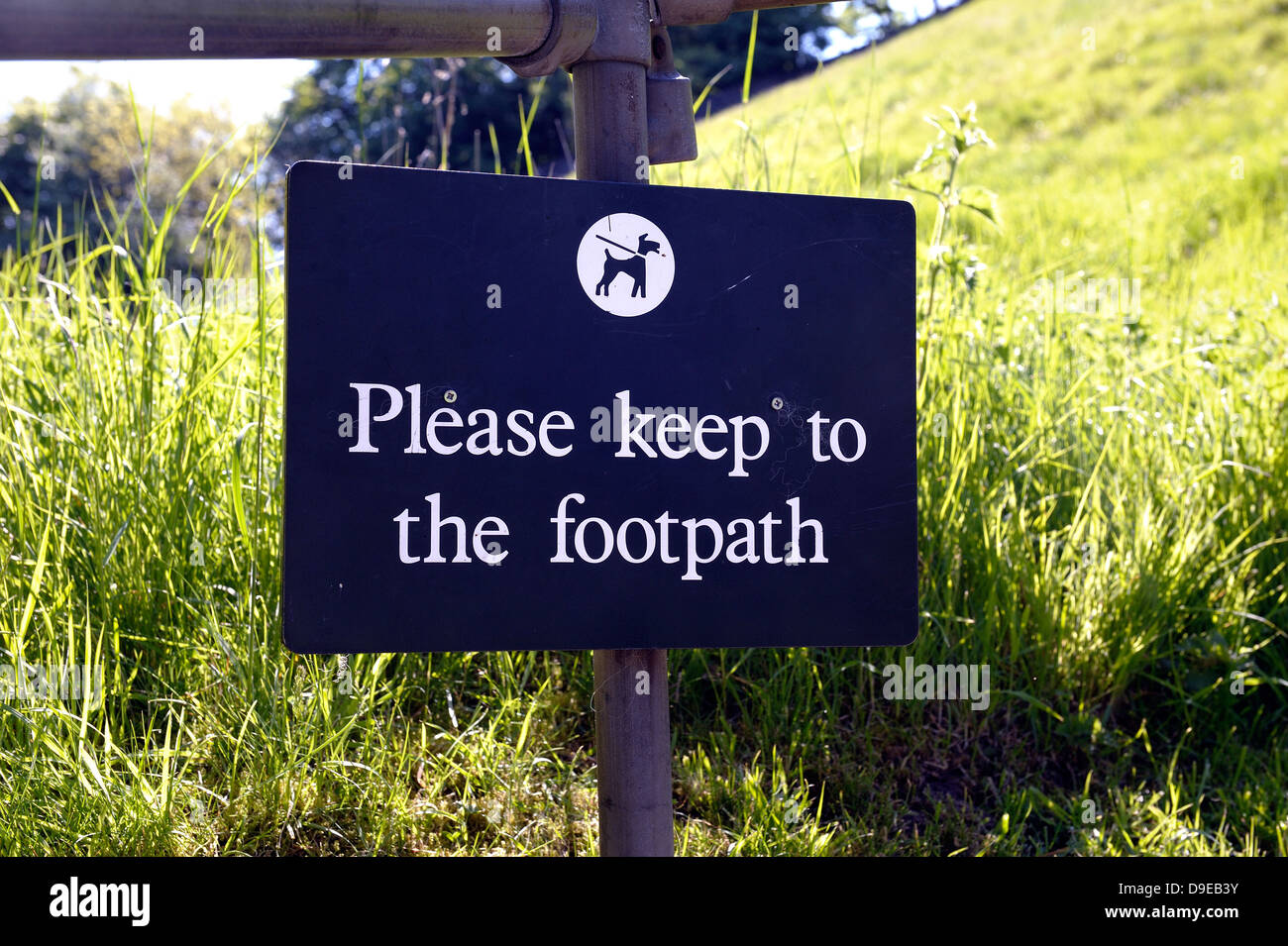 Please keep to the footpath sign england uk Stock Photo