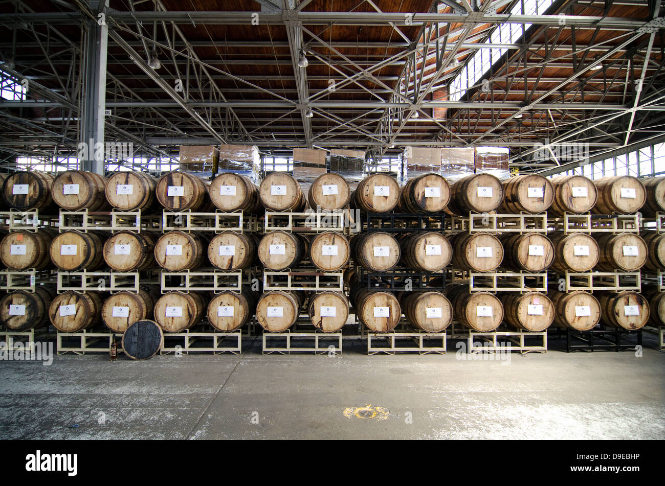 Barrels of whiskey are stacked in the St. George Distillery in Alameda, CA. Stock Photo