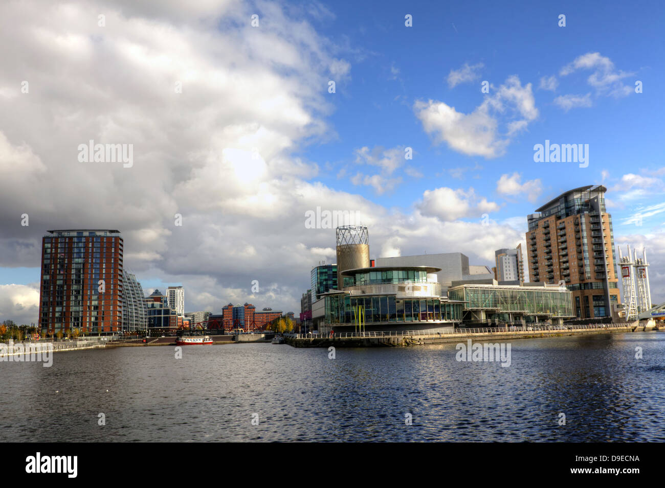 Cityscape with The Lawrys complex designed by Michael Wilford at Salford Quays in Manchester England. Stock Photo