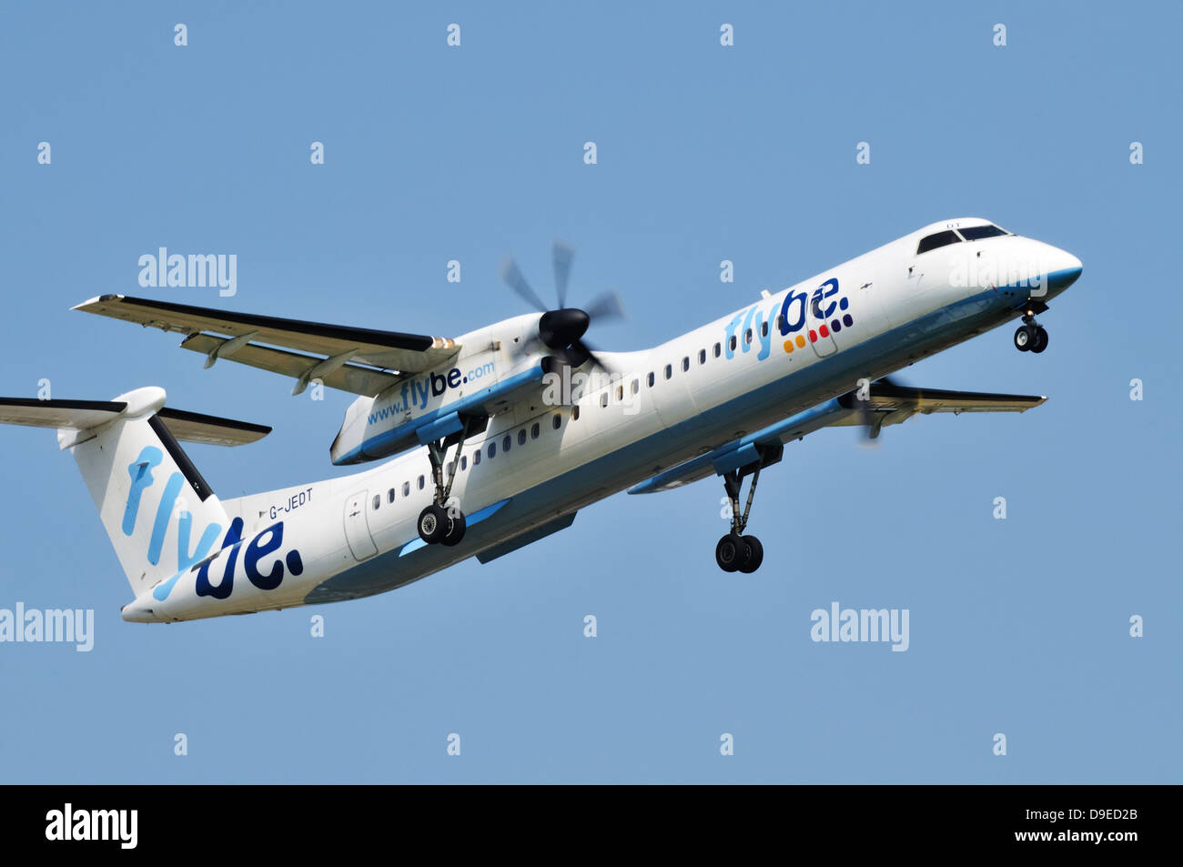 Side view of a Flybe de Havilland DHC-8 dash 8 turboprop airplane ...