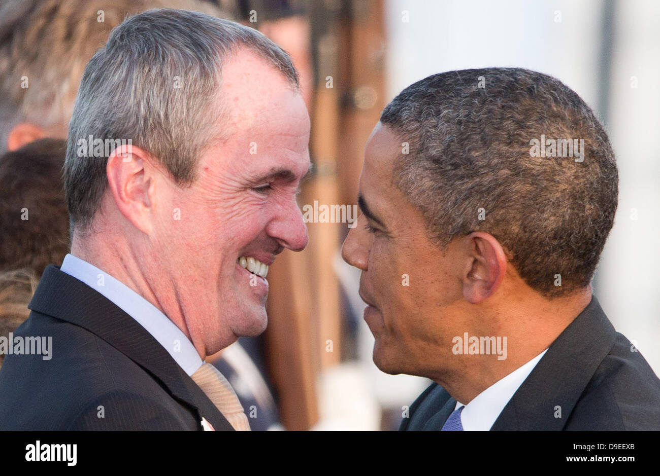Berlin, Germany. 18th June, 2013. US President Barack Obama shares a smile with US Ambassador to Germany Philip D. Murphy upon his arrival at Tegel Airport in Berlin, Germany, 18 June 2013. Photo: Michael Kappeler/dpa /dpa/Alamy Live News Stock Photo