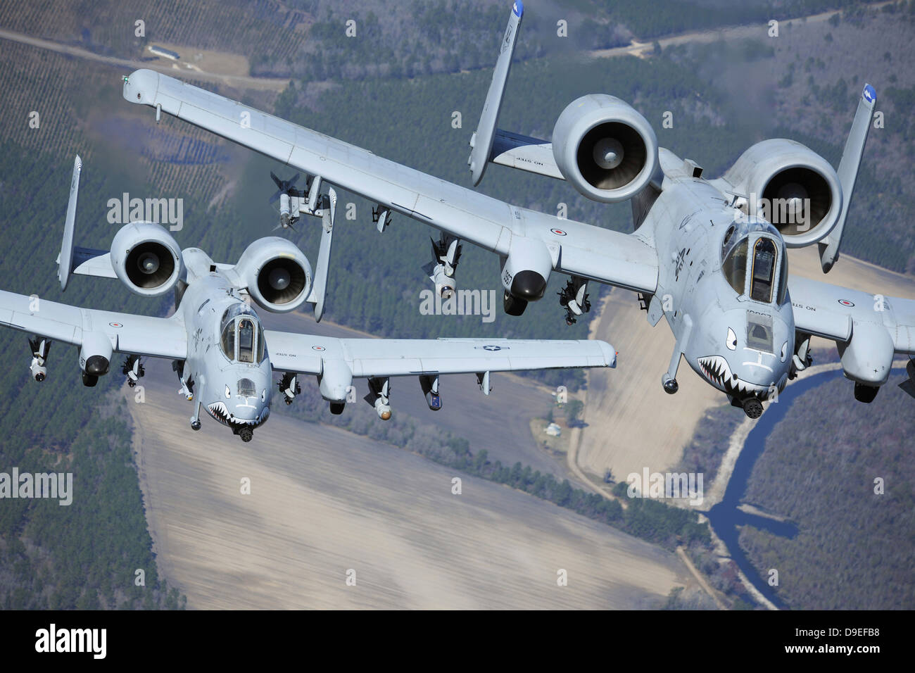 Two A-10C Thunderbolt II aircraft fly in formation. Stock Photo