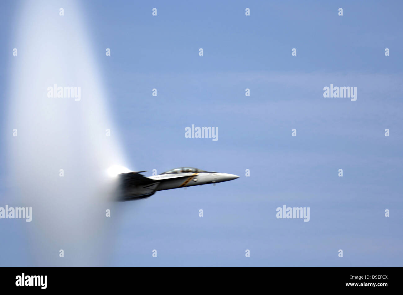 An F/A-18E Super Hornet reaches the speed of sound. Stock Photo