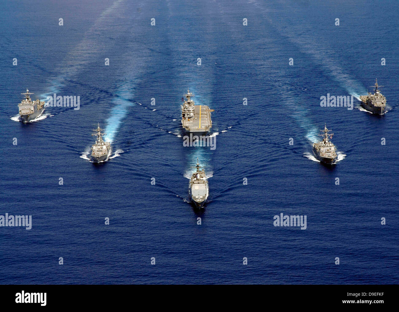 Ships of the Nassau Strike Group transit westward in the Atlantic Ocean. Stock Photo