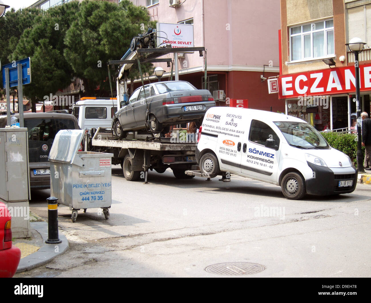 Traffic police lift a badly parked car on to a truck  in the Istanbul suburb of Pendik, April 2013 Stock Photo