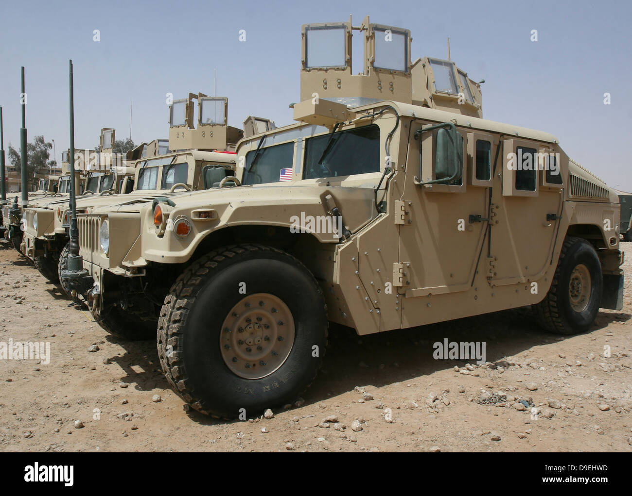 A row of humvees from Task Force Military Police. Stock Photo