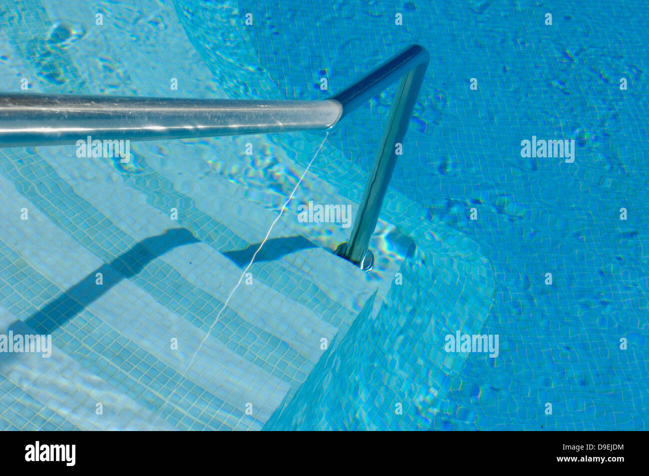 Blue tiles swimming pool stairs hi-res stock photography and images - Alamy