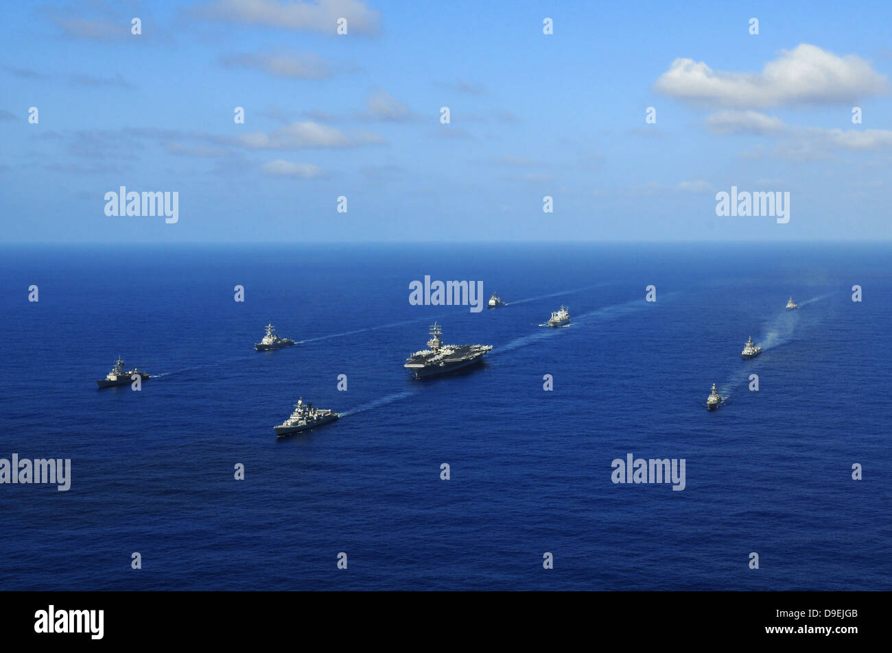 Ships from the Ronald Reagan Carrier Strike Group transit the Pacific Ocean. Stock Photo