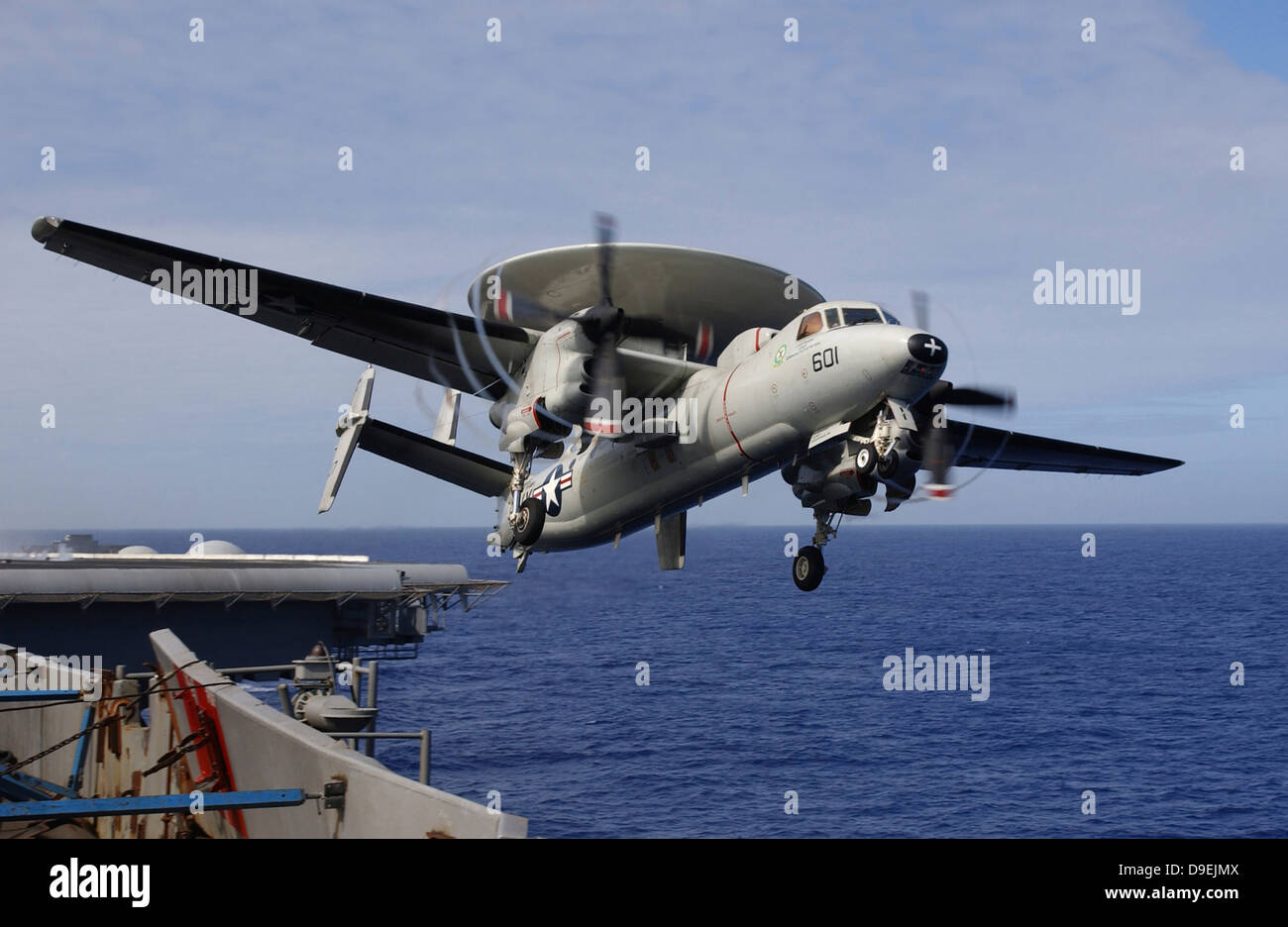 An E-2C Hawkeye launches from USS Kitty Hawk. Stock Photo