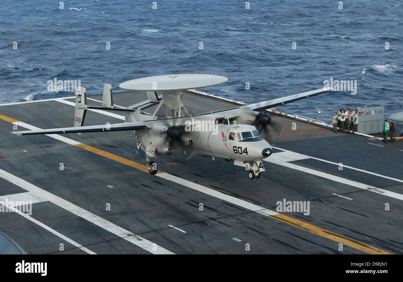 An E-2C Hawkeye is recovered during flight deck operations aboard USS Theodore Roosevelt. Stock Photo