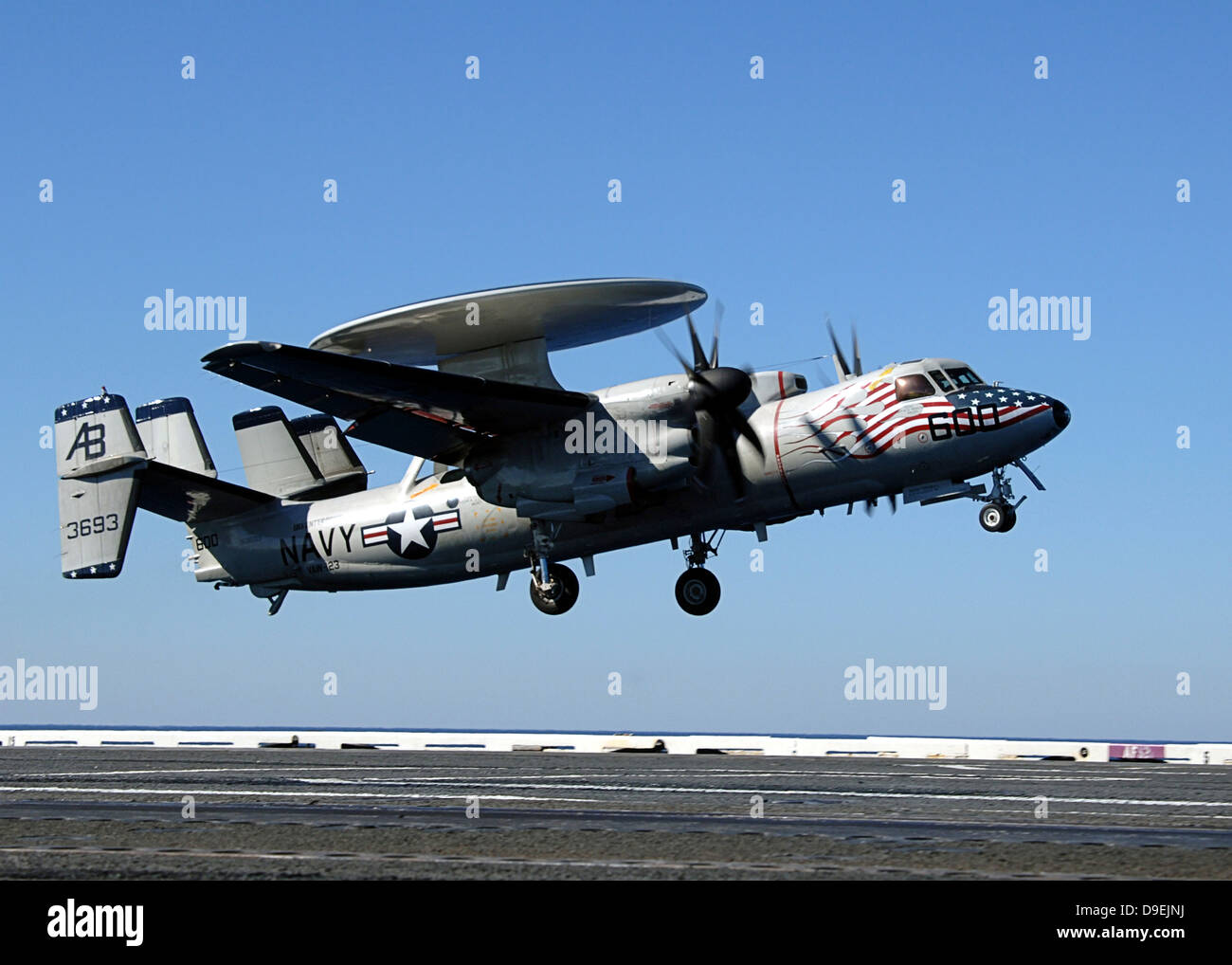An E-2C Hawkeye conducts a touch-and-go landing aboard USS Enterprise Stock Photo