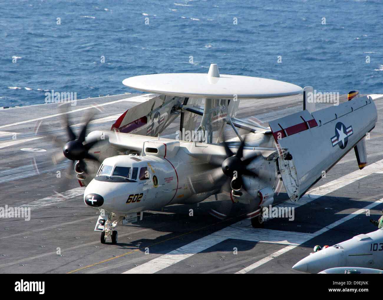 An E-2C Hawkeye taxiing on the flight deck aboard USS Dwight D. Eisenhower Stock Photo