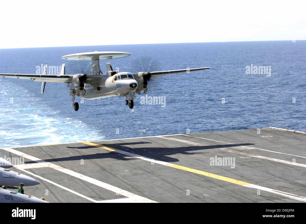 An E-2C Hawkeye makes its approach to the flight deck of USS Dwight D. Eisenhower. Stock Photo