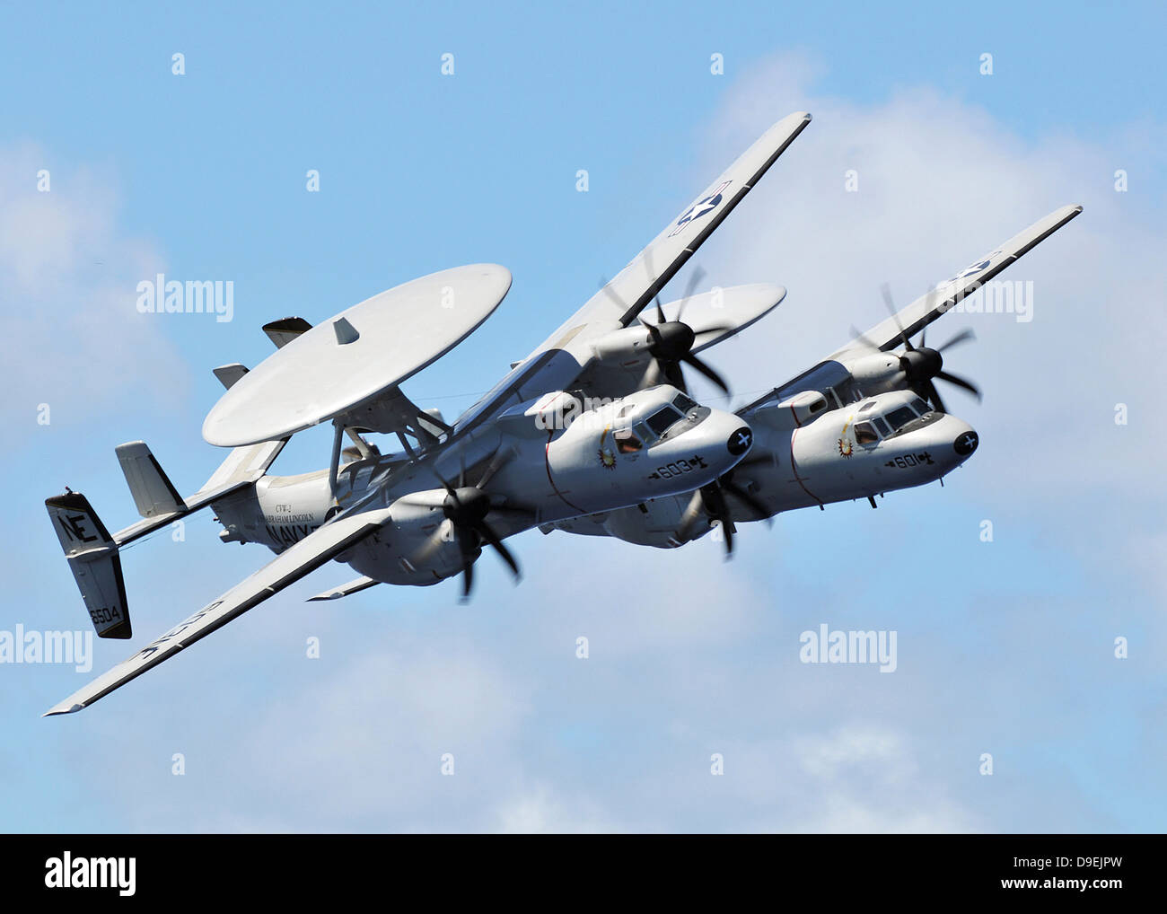 A pair of E-2C Hawkeyes in flight over the Pacific Ocean. Stock Photo