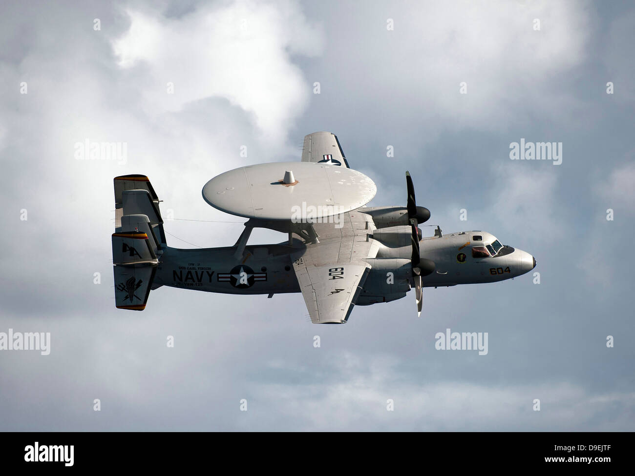 An E-2C Hawkeye in flight over the Pacific Ocean. Stock Photo