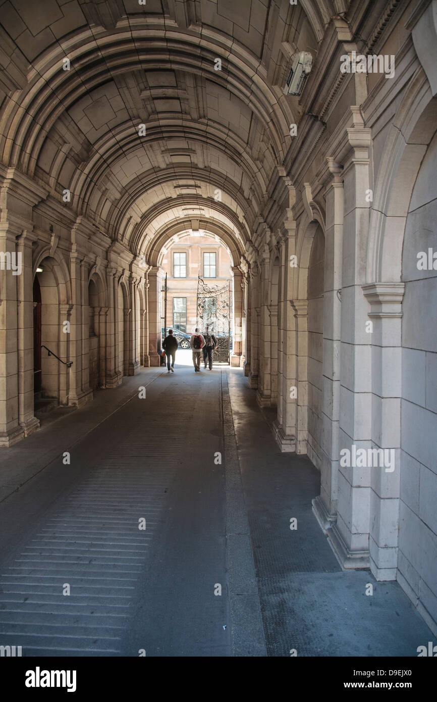 The archway that leads from Glasgow City Chambers building to Cochrane Street. Stock Photo