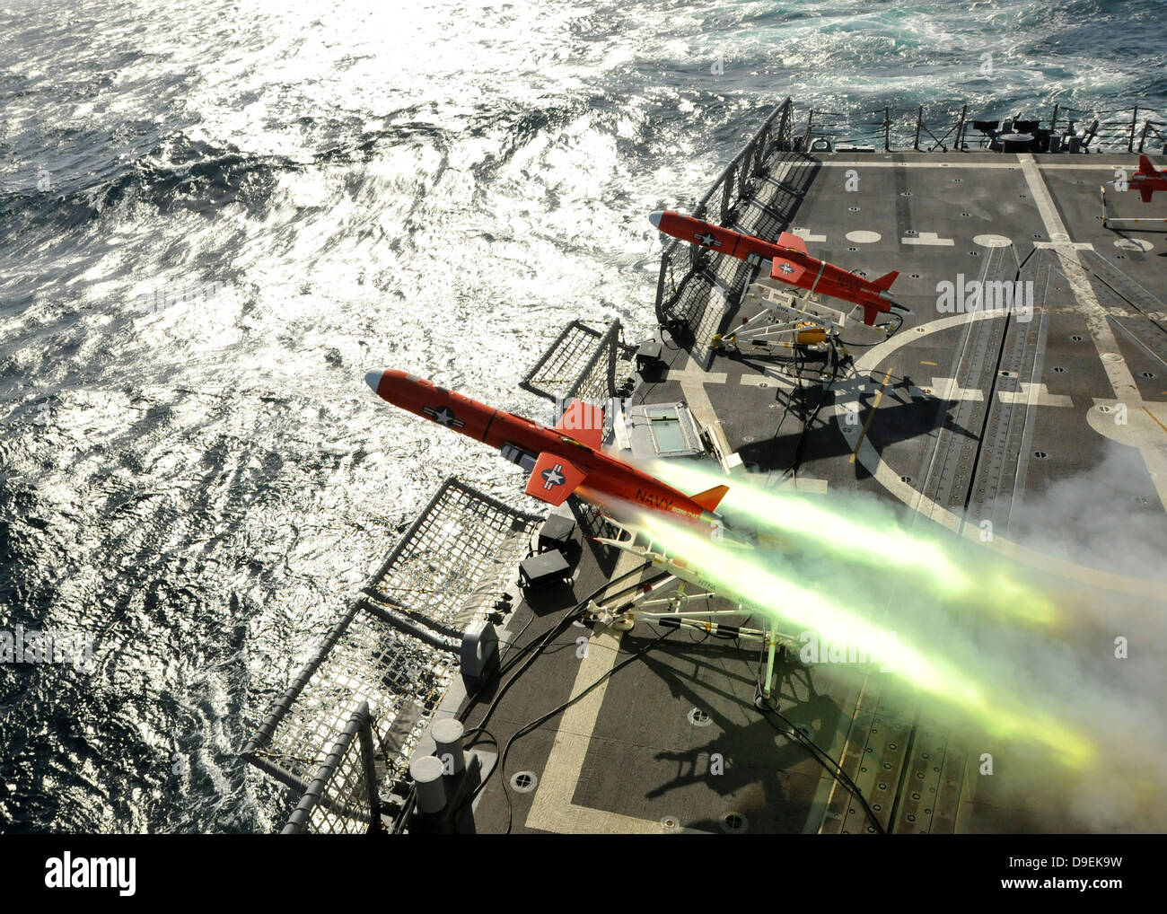 A BQM-74E aerial drone launches from the guided-missile frigate USS Thach. Stock Photo