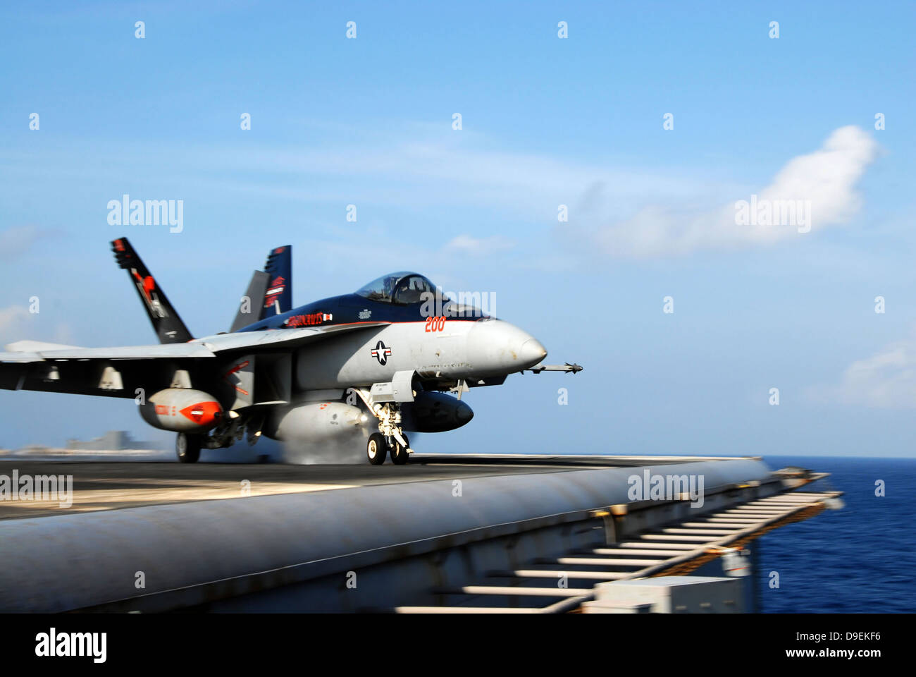 South China Sea, August 10, 2011 - An F/A-18E Super Hornet launches from the aircraft carrier USS Ronald Reagan. Stock Photo