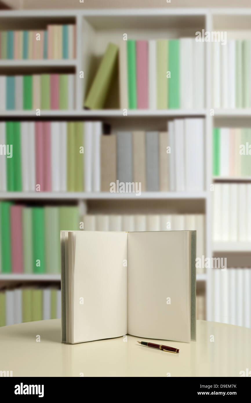 Book and white bookshelf Stock Photo