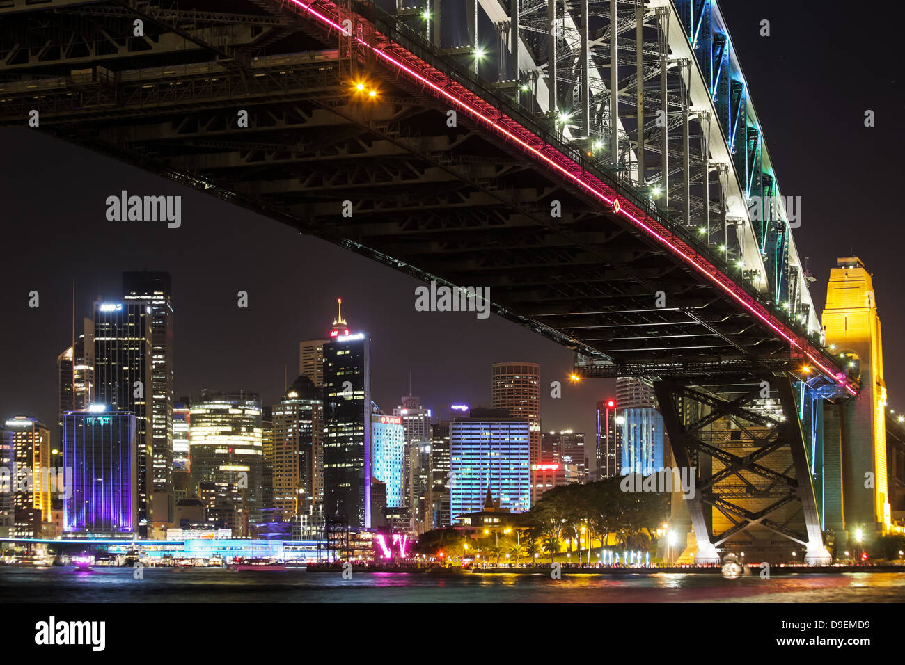 Wide angle view of the Sydney Harbour Bridge and Sydney's CBD at night during the annual Vivid Lighting Festival, Australia Stock Photo