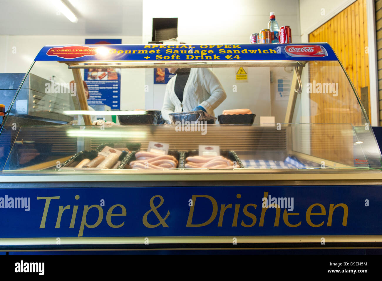A butcher selling tripe and drisheen in the English Market in the