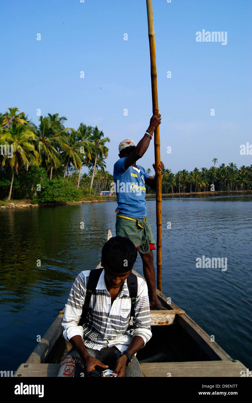 Canoe Boat Journey through the Backwaters of Kerala at Rural village area India Stock Photo