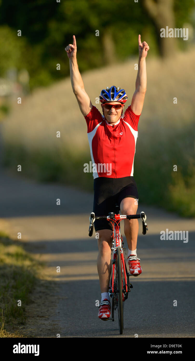 Winner's pose cheering joy emotion racing cyclist professional racing ...