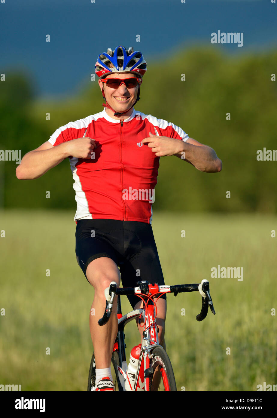 Winner's pose, cheering, joy, emotion, racing cyclist, professional ...