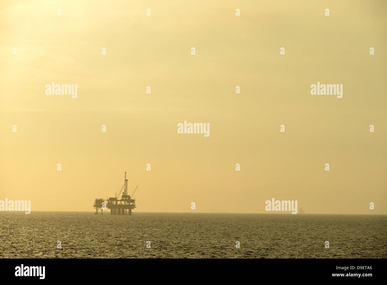 Offshore drilling rig before beach of Huntington Beach, California, the United States of America, the USA Stock Photo