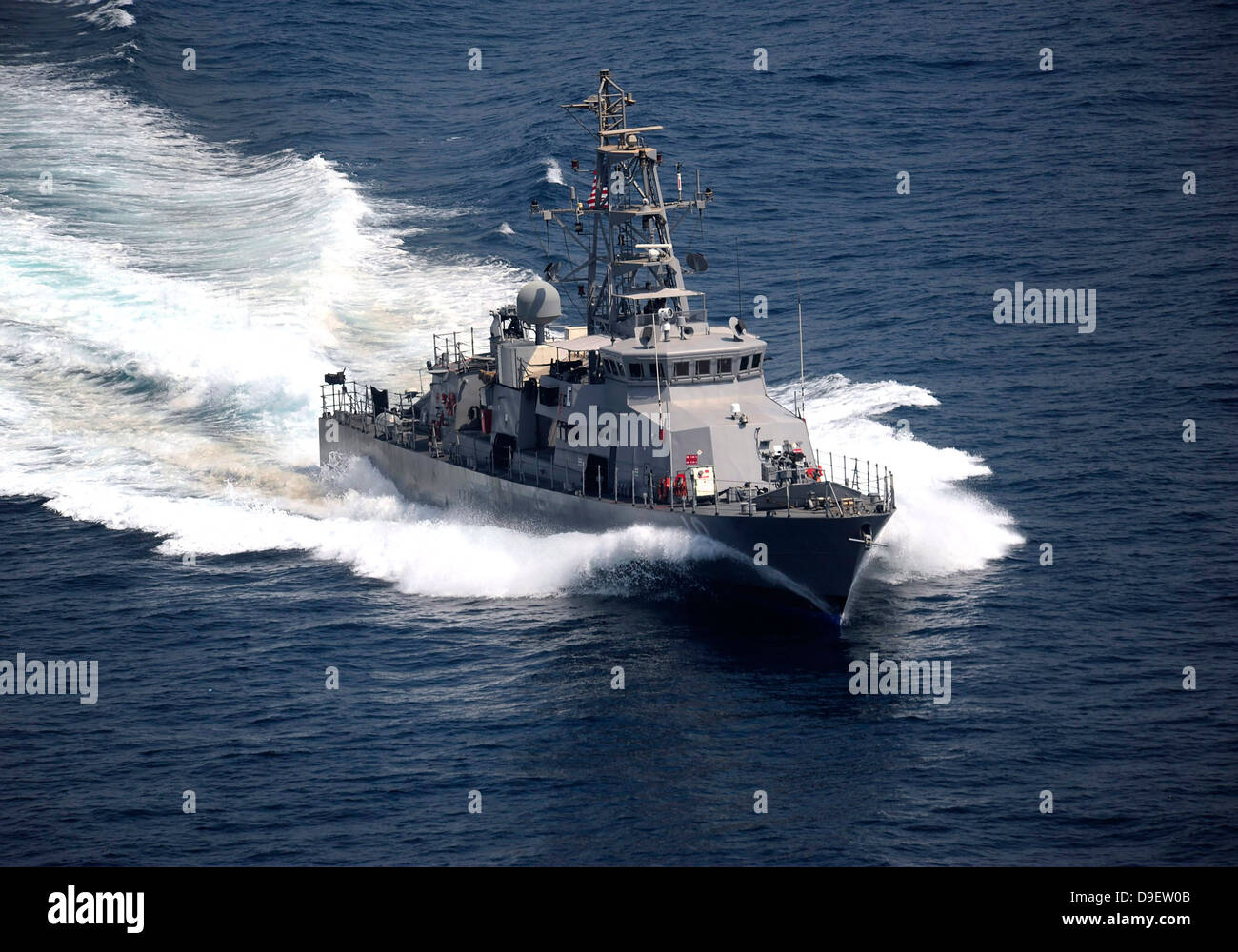 The cyclone-class coastal patrol ship USS Firebolt transits the Arabian Gulf. Stock Photo