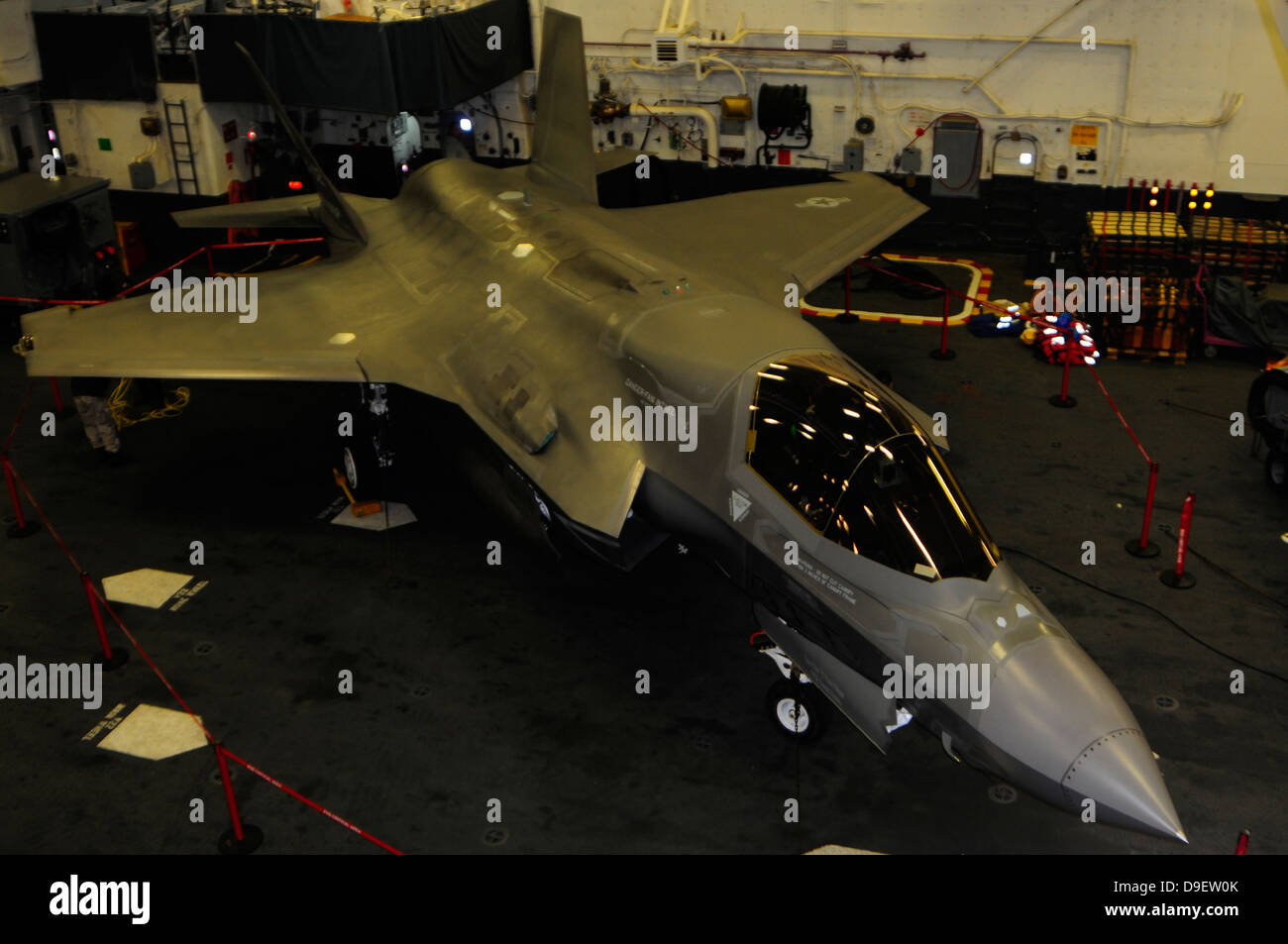 October 4, 2011 - An F-35B Lightning II is secured in the hangar bay aboard the amphibious assault ship USS Wasp (LHD 1). Stock Photo