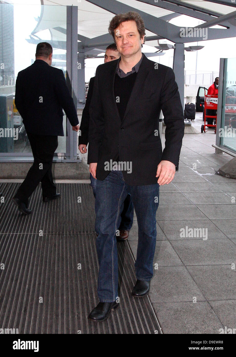Colin Firth arriving at the airport London, England - 22.02.11 Stock Photo
