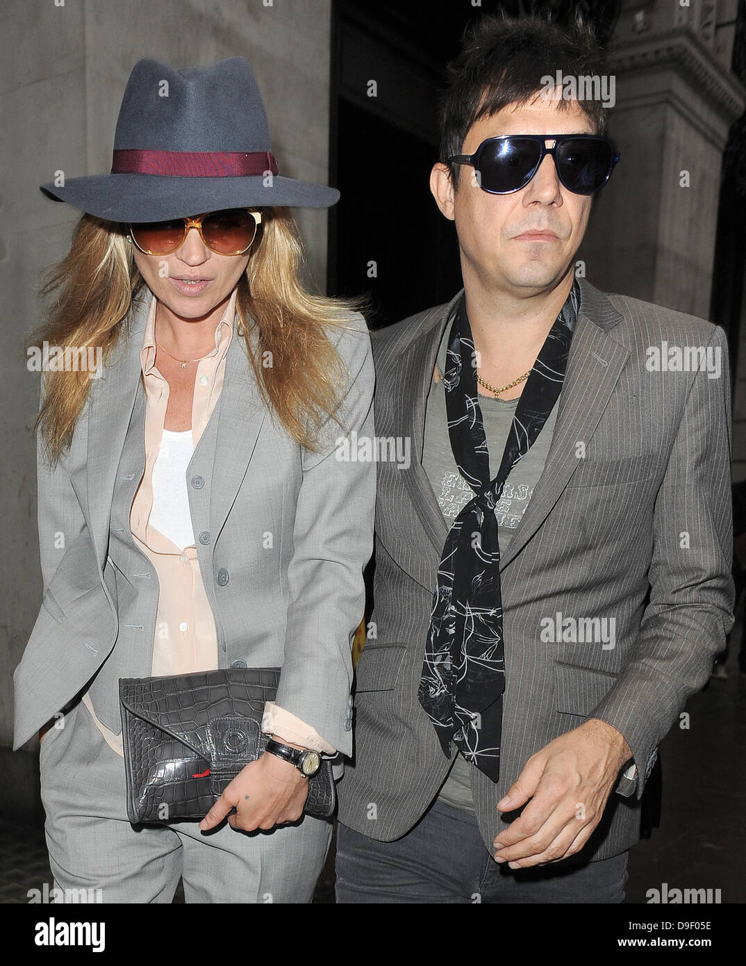 Newly engaged couple Kate Moss and Jamie Hince leave The Wolseley restaurant, having enjoyed a late lunch there with friends. London, England - 23.02.11 Stock Photo