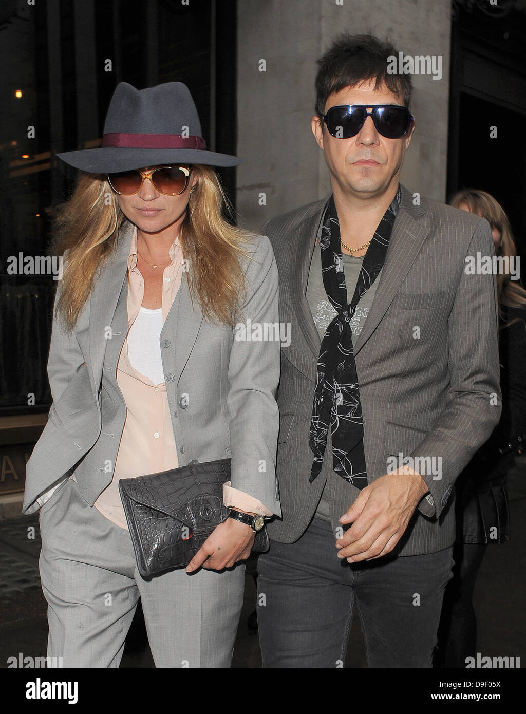 Newly engaged couple Kate Moss and Jamie Hince leave The Wolseley restaurant, having enjoyed a late lunch there with friends. London, England - 23.02.11 Stock Photo