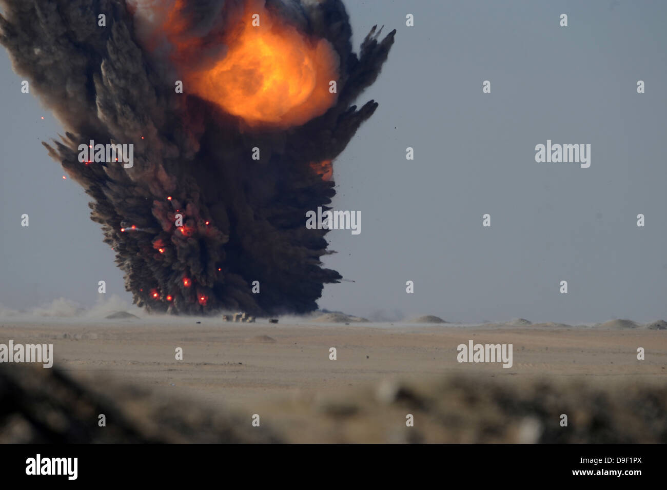 A munitions disposal explosion in Kuwait. Stock Photo