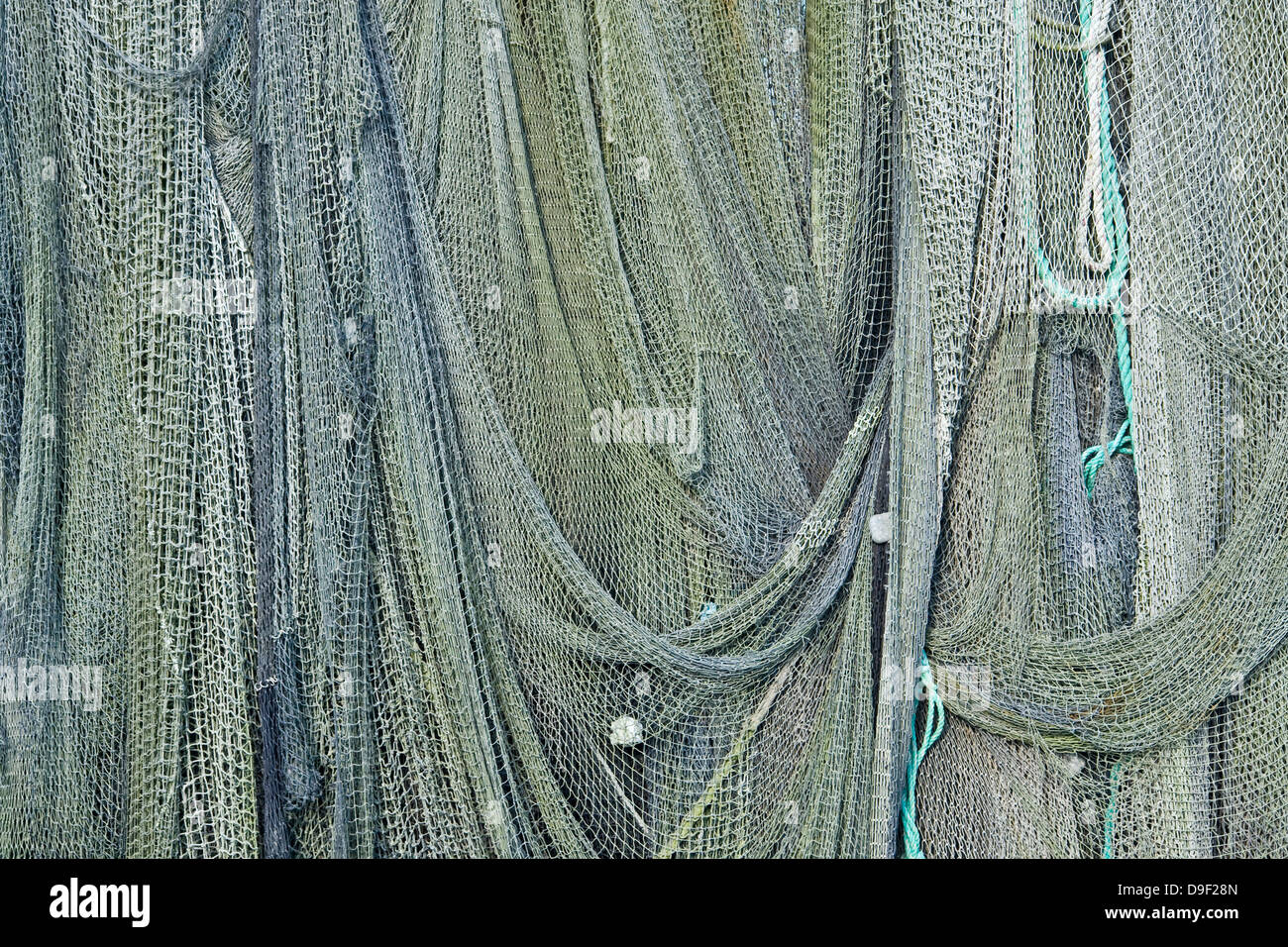 Fishing nets in the fishing port, Fishing of net in the fishing harbour Stock Photo