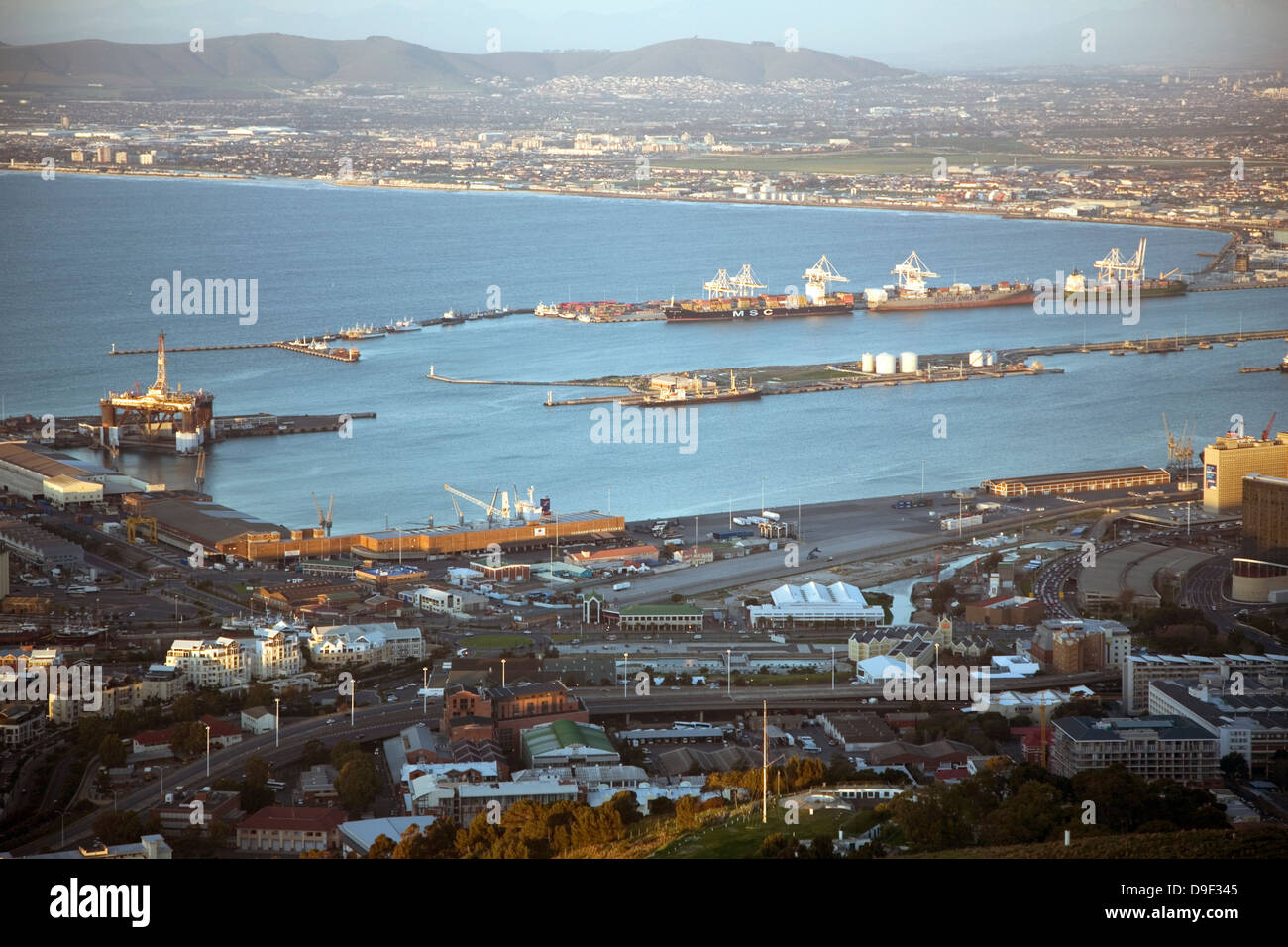 Cape Town's Duncan Dock receives ships from all over the world, nestled as it is in the corner of Table Bay. Stock Photo