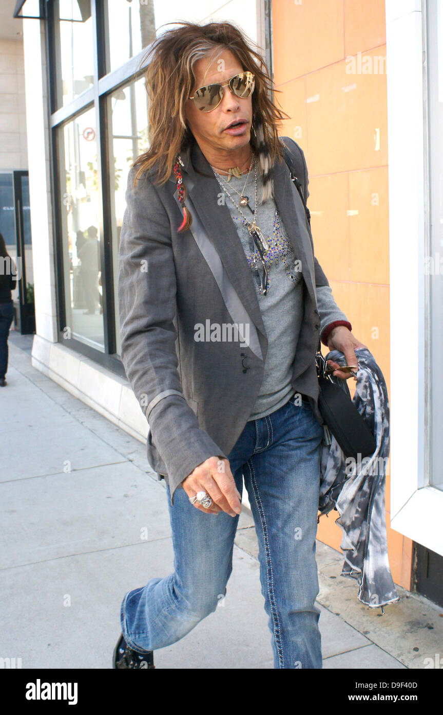 American Idol judge and frontman of Aerosmith Steven Tyler walking through  Beverly Hills whilst on a shopping trip. Tyler was waving his scarf at  photographers as he walked Beverly Hills, California -