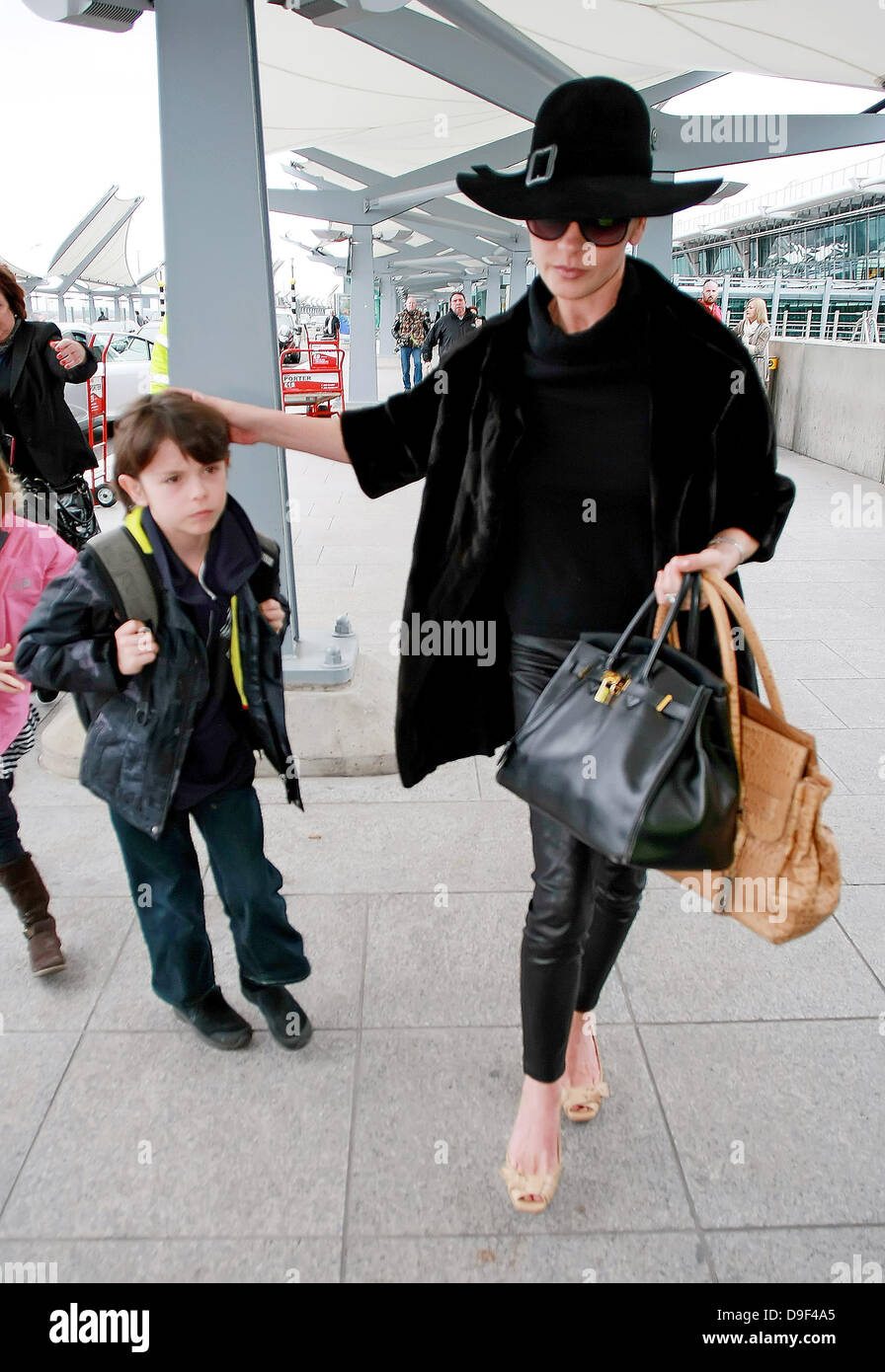 Catherine Zeta Jones and son Dylan Douglas arriving at Heathrow Airport ...